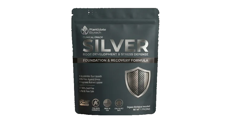 Plantidote root supplement package on a table with a plant in th